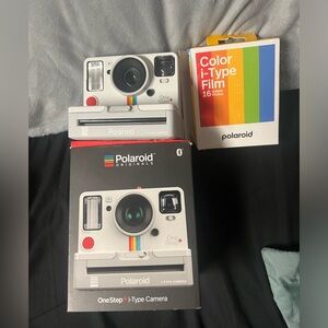 It comes with 2 packs of 8ct film it needs a charger (usb type)